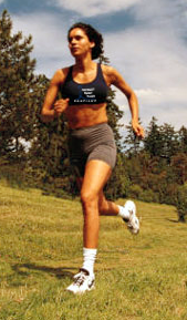 Picture of woman running wearing RinardPT logo